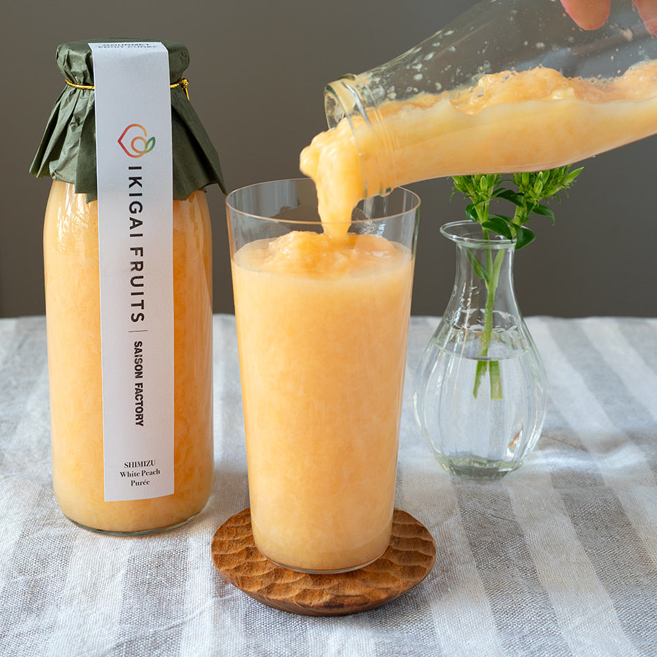 SHIMIZU White Peach Purees poured into a glass