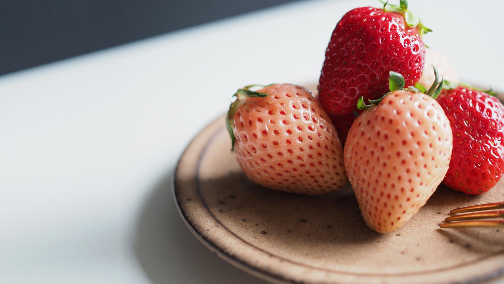 Pink and red Japanese strawberries