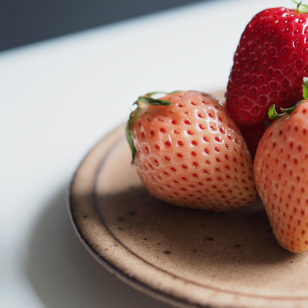 Pink and red Japanese strawberries