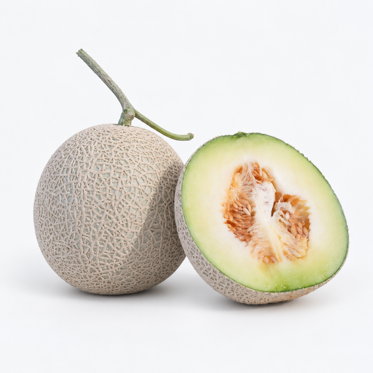 Premium Japanese green flesh melon with a whole melon and a freshly cut half showing its pale green flesh and seeds.